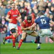 Scotland's full back Stuart Hogg (C) tackles Wales' full back Leigh Halfpenny (2L) during the Six Nations international rugby union match between Scotland and Wales at Murrayfield in Edinburgh, Scotland on Febuary 25, 2017