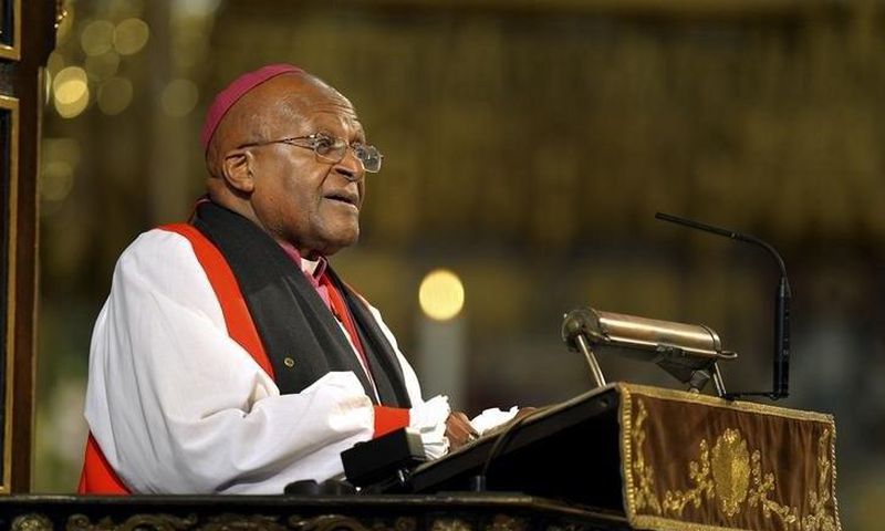Archbishop Desmond Tutu speaks during a memorial service for former South African President Nelson Mandela at Westminster Abbey in London March 3, 2014. REUTERS/John Stillwell/Pool/Files