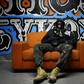 A member of the APOEL ultras, supporting Nicosia's football team of the same name, sits at their fan club headquarters in the Cypriot capital