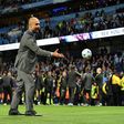 Manchester City's manager Pep Guardiola plays with a small ball on the pitch at the end of the English Premier League football match against West Bromwich Albion May 16, 2017