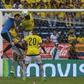 Uruguay's Diego Godin (2nd L) and Colombia's defender Yerry Mina (2nd R) jump for a header during their Russia 2018 FIFA World Cup qualifier football match in Barranquilla, Colombia, on October 11, 2016