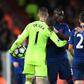 Manchester United's goalkeeper David de Gea (L) is thanked by defender Eric Bailly on October 17, 2016