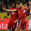 Bayern Munich's midfielder Thomas Mueller and his teammates celebrate during a Bundesliga football match against Borussia Moenchengladbach on March 19, 2017