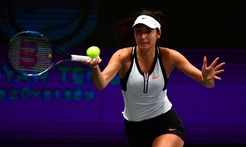 Oceane Dodin of France plays a forehand during her match against Timea Babos (not pictured) of Hungary during the WTA Hungarian Ladies Open in Budapest, on February 24 2017