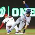 Joc Pederson of the Los Angeles Dodgers advances to second base against Danny Espinosa of the Washington Nationals on October 13, 2016 in Washington, DC