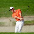 Rory McIlroy of Northern Ireland blasts from a bunker during practie for the World Golf Championships Mexico Championship at Club De Golf Chapultepec on March 1, 2017