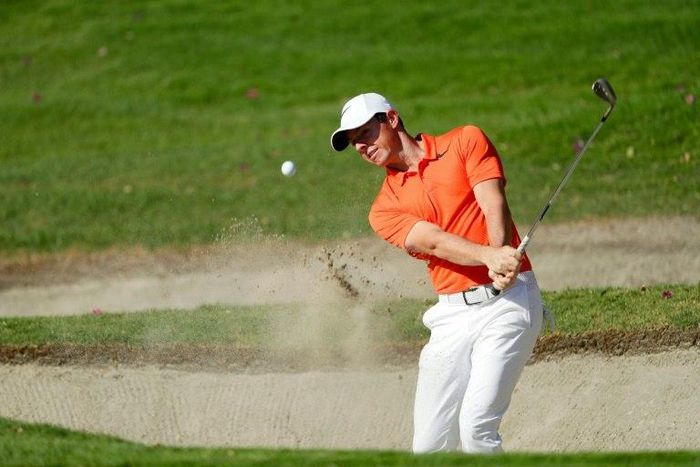 Rory McIlroy of Northern Ireland blasts from a bunker during practie for the World Golf Championships Mexico Championship at Club De Golf Chapultepec on March 1, 2017