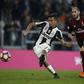 Juventus' forward Paulo Dybala from Argentina scores a penalty during the Italian Serie A football match Juventus Vs AC Milan on March 10, 2017 at the 'Juventus Stadium' in Turin