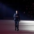 Artistic director for Dior Homme, Belgian fashion designer Kris Van Assche, acknowledges the public at the end of the men's Fashion Week for the Fall/Winter 2017/2018 collection in Paris on January 20, 2017
