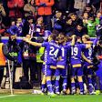Deportivo Alaves players celebrate after scoring their first goal during the Spanish Copa del Rey semi final second leg football match against RC Celta de Vigo February 8, 2017