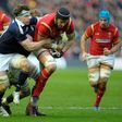 Scotland's Hamish Watson (left) tackles Wales' lock Luke Charteris during the Six Nations rugby union match at Murrayfield in Edinburgh on Febuary 25, 2017