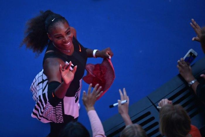 Serena Williams nearly scrawled with marker pen on an designer pink hat when she was handed it after her win over Johanna Konta