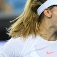 Canadian tennis player Eugenie Bouchard will be going on a date with a stranger after losing a Twitter bet on the Super Bowl result