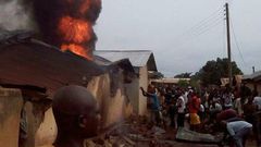 Residents trying to douse the flame