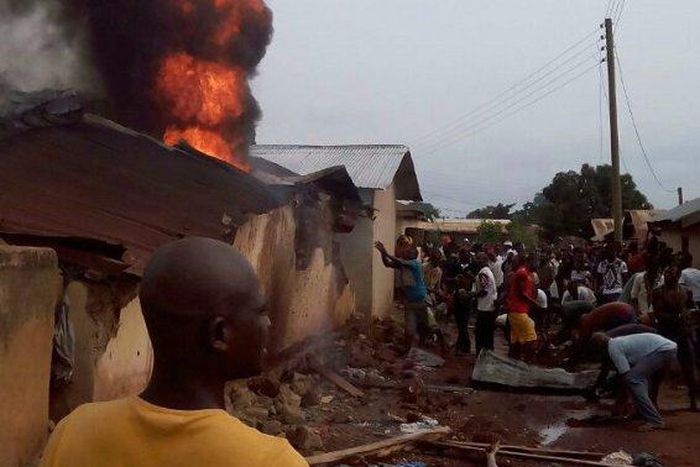 Residents trying to douse the flame