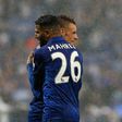 Leicester City's midfielder Riyad Mahrez (L) embraces striker Jamie Vardy during an English Premier League football match on May 7, 2016