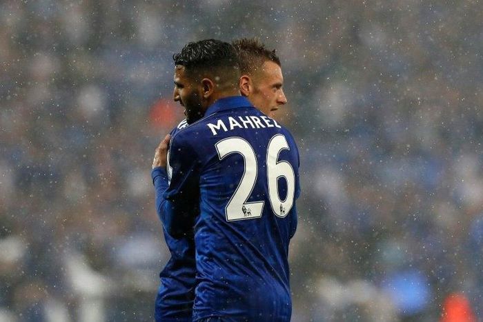 Leicester City's midfielder Riyad Mahrez (L) embraces striker Jamie Vardy during an English Premier League football match on May 7, 2016