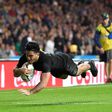 New Zealand's wing Nehe Milner-Skudder scores the first try during the final match of the 2015 Rugby World Cup between New Zealand and Australia at Twickenham stadium, south west London, on October 31, 2015