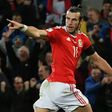 Wales' forward Gareth Bale celebrates after scoring the opening goal of the World Cup 2018 qualification match between Wales and Serbia at Cardiff City stadium in Cardiff on November 12, 2016