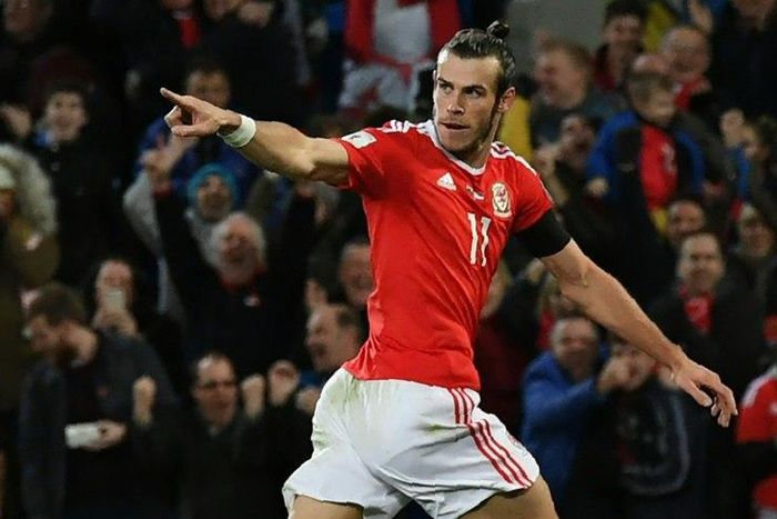 Wales' forward Gareth Bale celebrates after scoring the opening goal of the World Cup 2018 qualification match between Wales and Serbia at Cardiff City stadium in Cardiff on November 12, 2016