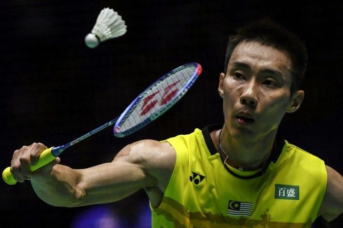 Lee Chong Wei of Malaysia hits a return to Wong Wing Ki Vincent of Hong Kong during their men's singles semi-final match at the Malaysia Open Badminton Superseries in Kuching on April 8, 2017