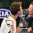 Australia's John Peers (L) and Finland's Henri Kontinen celebrate winning the men's doubles final of the Australian Open on January 28, 2017