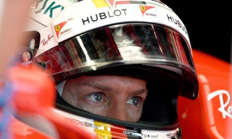 Ferrari's Sebastian Vettel sits in his car during practice for the Monaco Grand Prix, on May 25, 2017