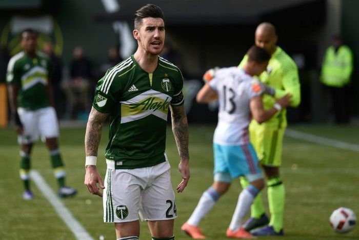 Liam Ridgewell #24 of Portland Timbers has some words with the side judge during the second half of the game against the Columbus Crew in Portland, Oregon