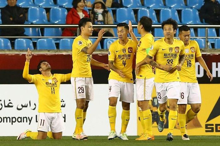 China's Guangzhou Evergrande players celebrate after scoring a goal during an AFC Champions League match in Pohang, South Korea