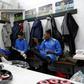 Sutton United players sit in the dressing room ahead of a team training session and media day at The Borough Sports Ground in Sutton, south-west London, on February 16, 2017