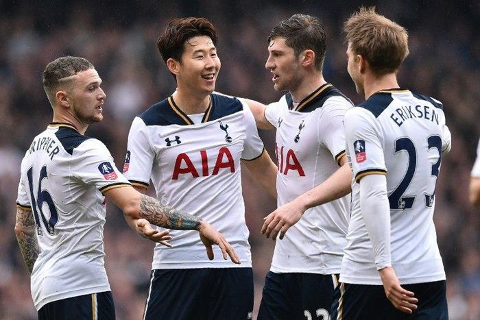 Tottenham Hotspur's striker Son Heung-Min (2L) celebrates scoring his team's second goal during the English FA Cup quarter-final football match against Millwall March 12, 2017