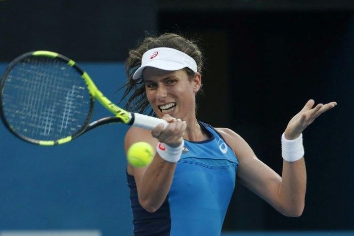 Johanna Konta of Britain capped an impressive week at the Sydney International by beating Agnieszka Radwanska 6-4, 6-2 in the final
