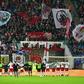 Leipzig's players celebrate with their fans after a German first division Bundesliga football match on November 6, 2016