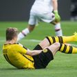 Dortmund's forward Marco Reus falls during the German First division Bundesliga football match against Bayer 04 Leverkusen March 4, 2017
