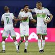 Algeria's forward Riyad Mahrez (C) celebrates with midfielder Yacine Brahimi (R) and forward Islam Slimani after scoring a second goal during the 2017 Africa Cup of Nations group B football match against Zimbabwe in Franceville on January 15, 2017