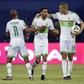 Algeria's forward Riyad Mahrez (C) celebrates with midfielder Yacine Brahimi (R) and forward Islam Slimani after scoring a second goal during the 2017 Africa Cup of Nations group B football match against Zimbabwe in Franceville on January 15, 2017
