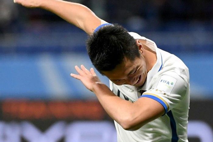 Yuma Suzuki of Japan's Kashima Antlers celebrates his goal during the Club World Cup semi-final against Colombia's Atletico Nacional in Osaka on December 14, 2016