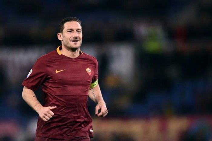 Roma's forward from Italy Francesco Totti was called "a cretin, an idiot who says 'famo lo stadio'," by a top Italian art critic