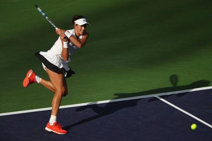 Garbine Muguruza (pictured) of Spain survived a fierce challenge from US teenager Kayla Day to reach the fourth round of the WTA Indian Wells hard court tournament in California, on March 12, 2017