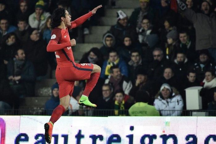 Paris Saint-Germain's forward Edinson Cavani celebrates after scoring a goal on January 21, 2017