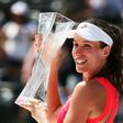 Johanna Konta of Great Britain holds the winner's trophy after defeating Caroline Wozniacki of Denmark after the Women's Final on Day 13 of the Miami Open at Crandon Park Tennis Center on April 1, 2017 in Key Biscayne, Florida