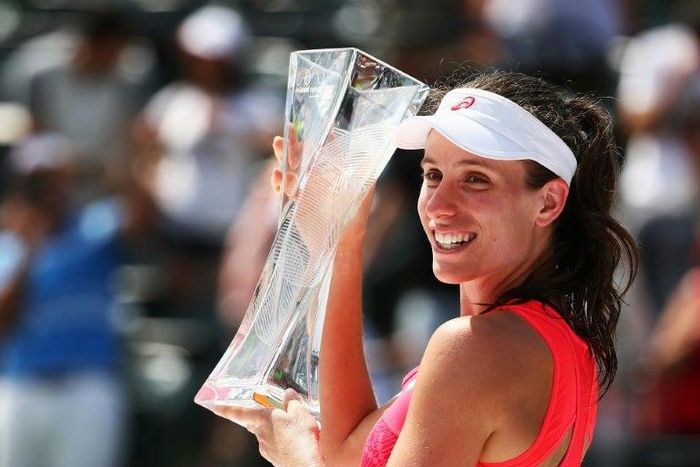 Johanna Konta of Great Britain holds the winner's trophy after defeating Caroline Wozniacki of Denmark after the Women's Final on Day 13 of the Miami Open at Crandon Park Tennis Center on April 1, 2017 in Key Biscayne, Florida