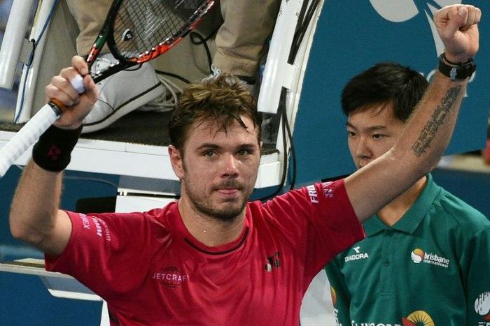 Stan Wawrinka celebrates his victory against Viktor Troicki in the men's second round at the Brisbane International tennis tournament on January 4, 2017