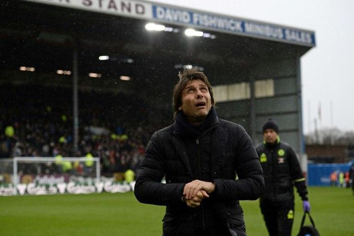 Chelsea's Italian head coach Antonio Conte arrives for the English Premier League football match between Burnley and Chelsea at Turf Moor in Burnley, north west England on February 12, 2017