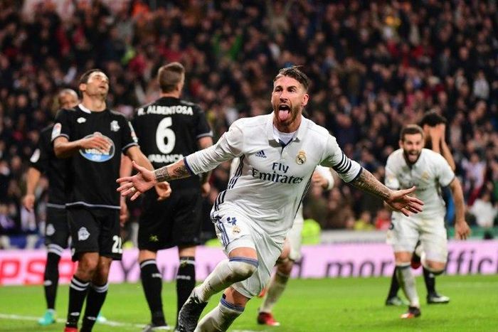 Real Madrid's defender Sergio Ramos celebrates after scoring on December 10, 2016