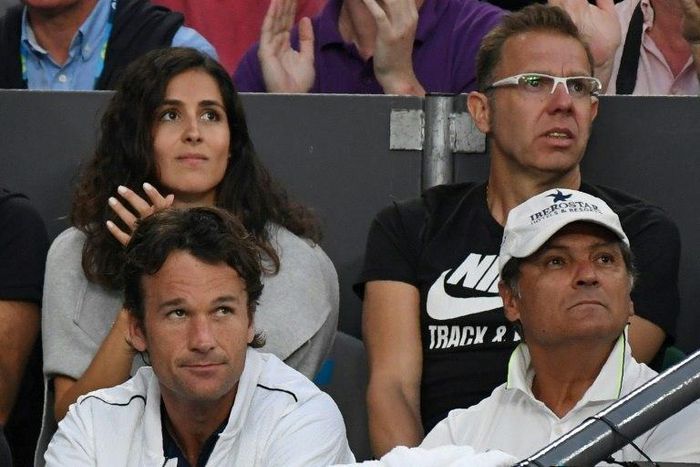 Toni Nadal (bottom R), uncle and coach of Spain's Rafael Nadal, watches him play against Bulgaria's Grigor Dimitrov during their Australian Open semi-final in Melbourne on January 27, 2017