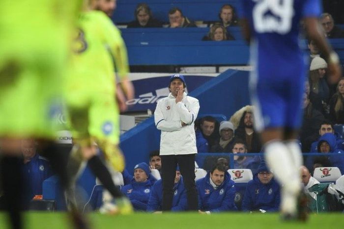 Chelsea's head coach Antonio Conte watches from the touchline during the English FA Cup third round football match against Peterborough at Stamford Bridge in London on January 8, 2017