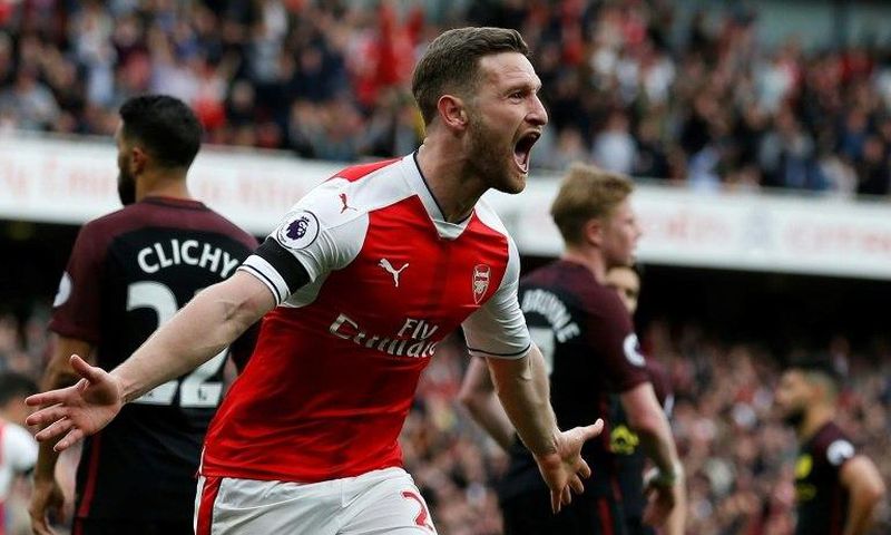 Arsenal's Shkodran Mustafi celebrates after scoring against Manchester City during a Premier League match at The Emirates stadium in London, on April 2, 2017
