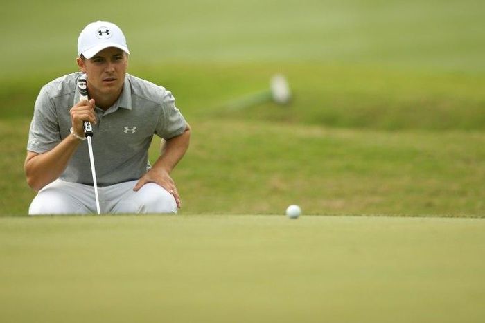 Jordan Spieth lines up a putt on the 6th hole of his match during round one of the World Golf Championships-Dell Technologies Match Play at the Austin Country Club on March 22, 2017