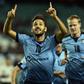 Sydney FC midfielder Milos Ninkovic (C) has been named the A-League's best player